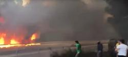 Xente tentando apagar un incendio / Youtube