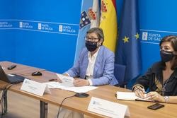 A conselleira Rosa Quintana e a  directora xeral de Desenvolvemento Pesqueiro, Susana Rodríguez, inauguran por videoconferencia a xornada Comportamento ecosistémico e biolóxico dá coquina en Galicia, organizada polo Centro de Investigacións Mariñas.. CONCHI PAZ / Europa Press